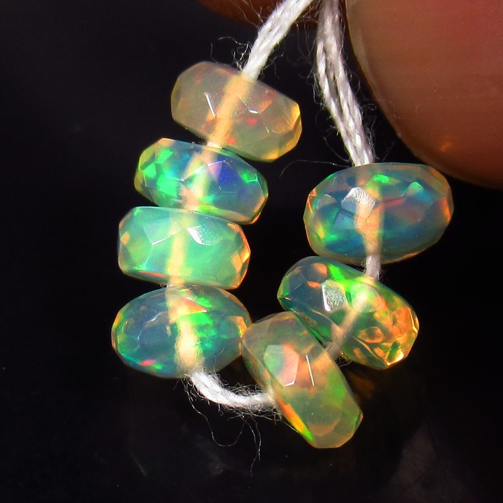 2.31 Ctw Natural 7 Drilled Faceted Fire Opal Beads: No Reserve! Title: 2.31 Ctw Natural 7 Drilled Faceted Fire Opal Beads Stone Clarity: Transparent Gemstones: Natural Faceted Fire Opal Beads Carat Weights: 2.31 Size/Dimensions: 4.70 to 5.10 mm / 7 PC'