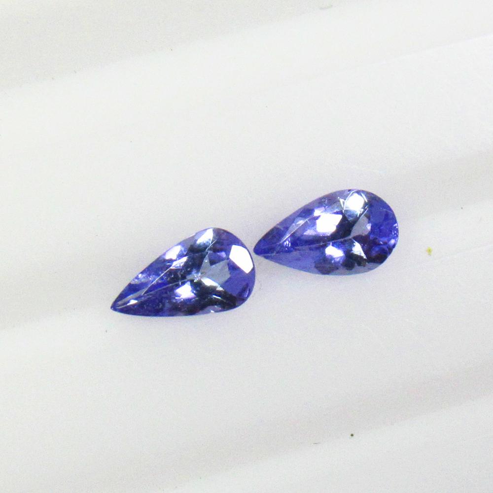 0.41 Ctw Natural Tanzanite Pear Pair: No Reserve! Title: 0.41 Ctw Natural Tanzanite Pear Pair Stone Clarity: VVS Gemstones: Natural Tanzanite Carat Weights: 0.41 Size/Dimensions: 5.00 x 3.00 x 2.00 mm / 2 P'cs Additional Information: Top 