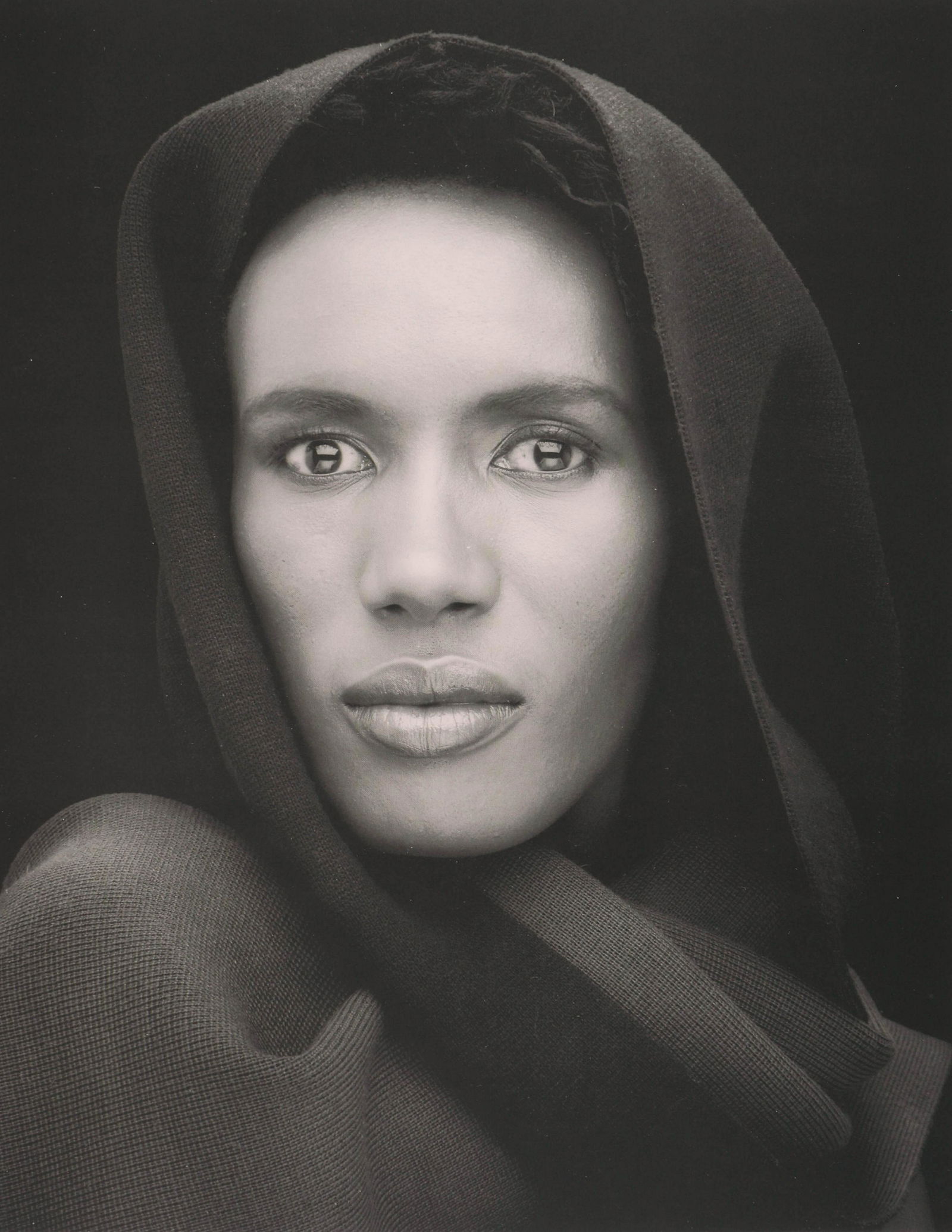 MAPPLETHORPE - Grace Jones, 1988: Artist: MAPPLETHORPE Print Title: Grace Jones, 1988 Medium: Duotone Photo-lithograph Printed 1990s in Italy Image size (inches) approx. 9.5 x 7.5” Robert Mapplethorpe was an American photographe