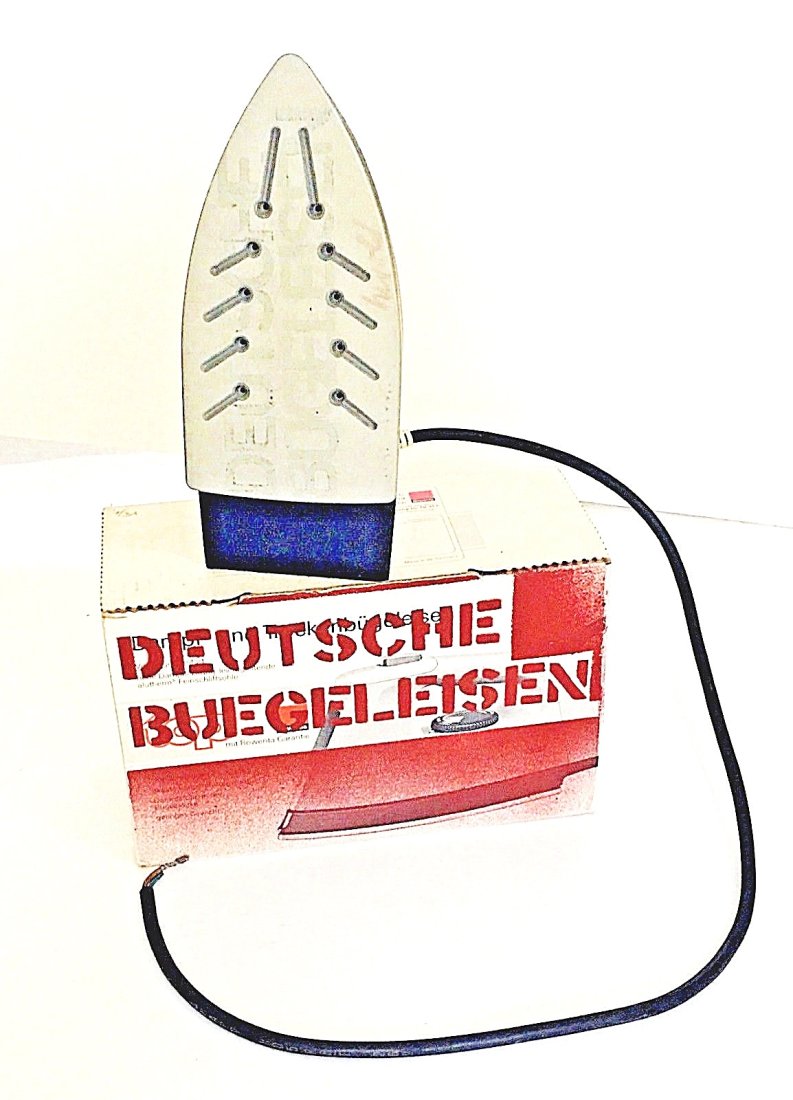 Georg Herold: Deutche Buegeleisen 1990: Artist: Georg Herold Title: Deutche Buegeleisen 1990 Additional Information: Mixed media sculpture with paint. 10 1/2" x 6 1/4" x 4 1/4" box, Iron is 10" x 4 1/4" x 5". Stenciled Box and Iron, artist
