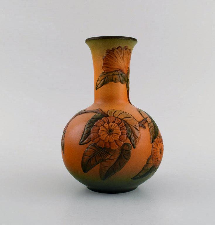 Ipsen's, Denmark. Art nouveau vase in hand-painted ceramics with flowers and foliage in relief. (1 of 6)