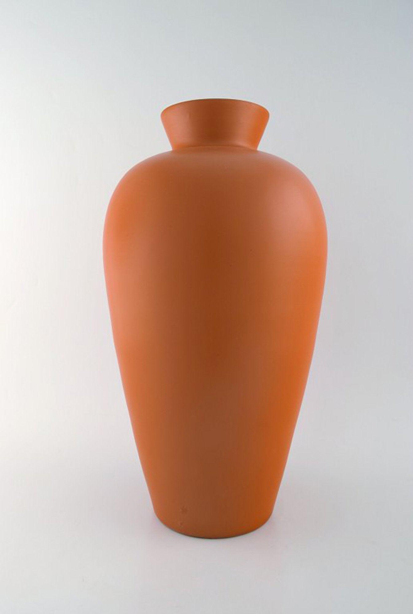 Upsala-Ekeby. Large ceramic vase, orange glaze. Stylish design. 1960/70'erne.: Upsala-Ekeby. Large ceramic vase, orange glaze. Stylish design. 1960/70'erne. Stamped. In very good condition. Measures: 44 x 24 cm. Reserve: $525.00 Shipping: Domestic: Shipping rates are determined