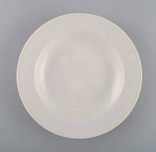Royal Copenhagen. Salto Service, White. Deep plate. 1960s.: Royal Copenhagen. Salto Service, White. Deep plate. 1960s. Measures: 23 x 4.5 cm. In excellent condition. 1st factory quality. Designed by Axel Salto in 1956. Reserve: $49.00 Shipping: Domestic: Shipp