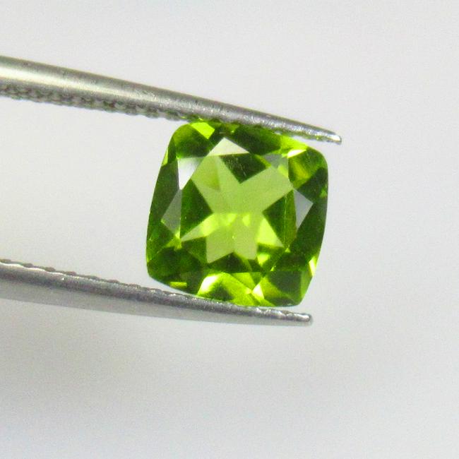 1.67 Ctw Natural Pakistan Peridot Cushion Cut: No Reserve! Title: 1.67 Ctw Natural Pakistan Peridot Cushion Cut Stone Clarity: VVS Gemstones: Natural Peridot Carat Weights: 1.67 Size/Dimensions: 7.10 x 7.00 x 4.20 mm Additional Information: Top Cl