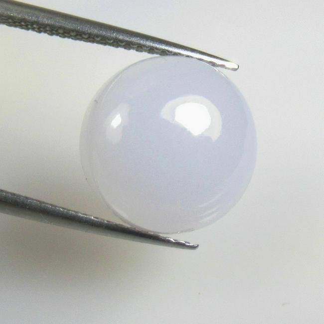 6.64 Ctw Natural Moonstone Round Cab: No Reserve! Title: 6.64 Ctw Natural Moonstone Round Cab Stone Clarity: Semi-Transparent Gemstones: Natural Moonstone Carat Weights: 6.64 Size/Dimensions: 12.30 x 12.30 x 5.70 mm Additional Information