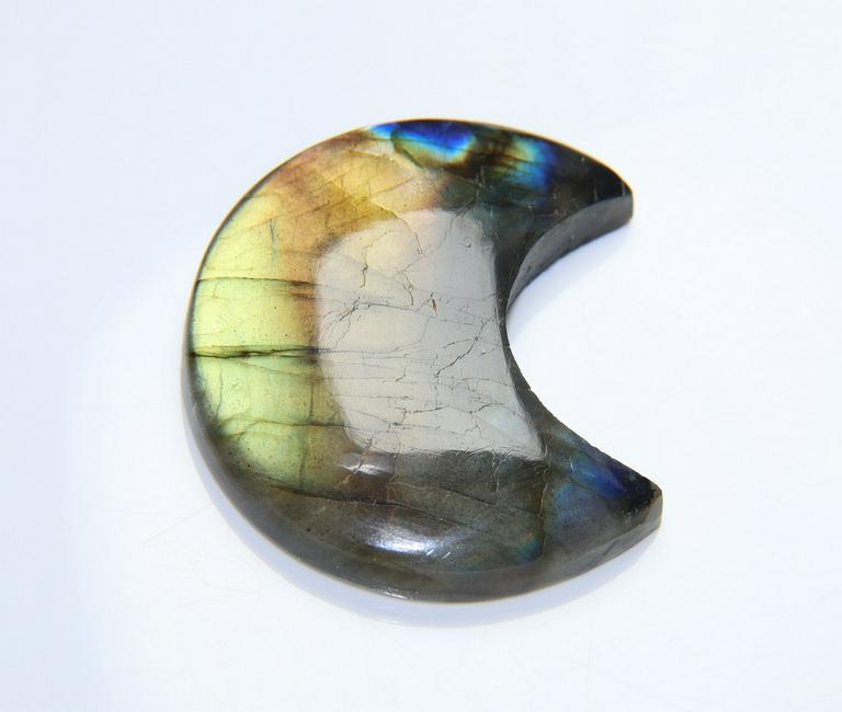 Stunning Flashy 51.74 Cts Natural Labradorite: No Reserve! Title: Stunning Flashy 51.74 Cts Natural Labradorite Additional Information: Gemstone : Natural Labradorite Shape : Crescent Cabochan Weight : 51.74 carats Measurements : 32x19 mm, Color :