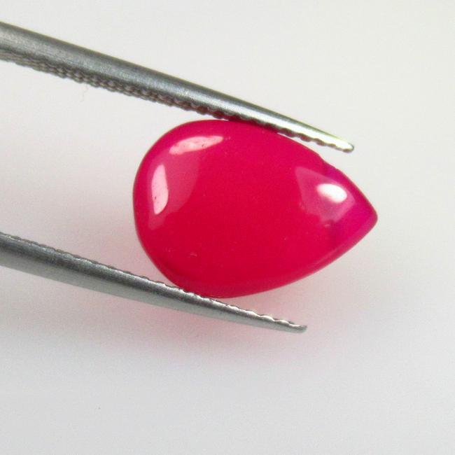 3.30 Ctw Natural Drilled Pink Onyx Pear Cab: No Reserve! Title: 3.30 Ctw Natural Drilled Pink Onyx Pear Cab Stone Clarity: Opaque Gemstones: Natural Onyx Carat Weights: 3.3 Size/Dimensions: 12.50 x 9.20 x 4.00 mm Additional Information: Very Goo
