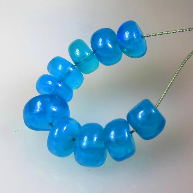 4.93 Ctw Natural 10 Drilled Neon Blue Fire Opal Beads: No Reserve! Title: 4.93 Ctw Natural 10 Drilled Neon Blue Fire Opal Beads Stone Clarity: Translucent Gemstones: Natural Opal Beads Carat Weights: 4.93 Size/Dimensions: 4.60 to 6.10 mm / 10 PC's Additio