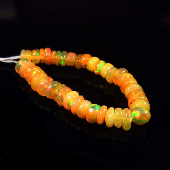 Natural Multicolor Opal Beads - 4.76 Ct: No Reserve! Title: Natural Multicolor Opal Beads - 4.76 Ct Origin: Ethiopia Weight: 4.76 Size/Dimensions: 4.2 - 4.8 mm Additional Information: Pieces : 40 No's / Shape : Drilled Round Beads / Clarity 