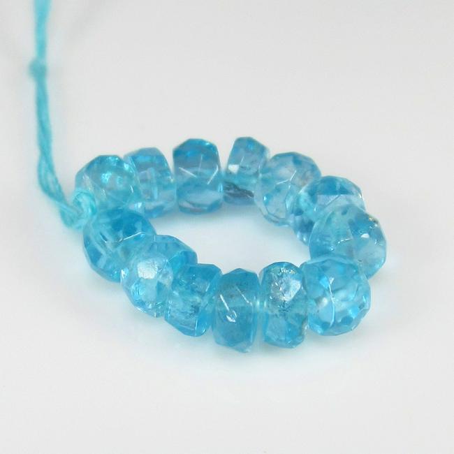 Natural Apatite Beads - 4.37 Ct: No Reserve! Title: Natural Apatite Beads - 4.37 Ct Origin: Brazil Weight: 4.37 Size/Dimensions: 3.2 - 3.5 mm Additional Information: Pieces : 13 No's / Shape : Round Drilled Beads / Color : Blue / Cla