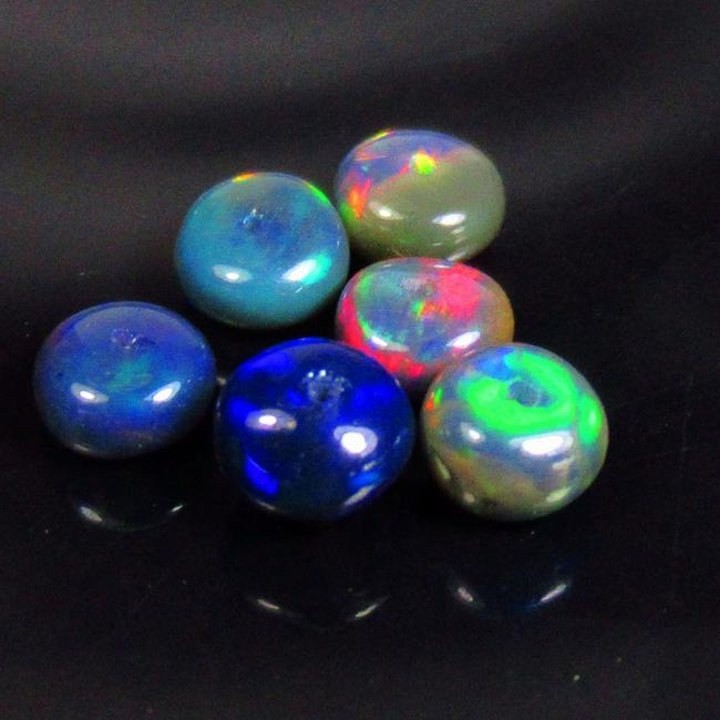 3.18 Ctw Natural 6 Drilled Black Fire Opal Round Beads: No Reserve! Title: 3.18 Ctw Natural 6 Drilled Black Fire Opal Round Beads Stone Clarity: Translucent Gemstones: Natural Black Opal Beads Carat Weights: 3.18 Size/Dimensions: 5.50- 5.80 mm / 6 P'cs Add