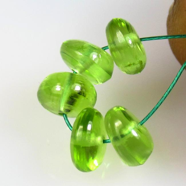5.30 Ctw Natural 5 Pakistan Peridot Drilled Round Beads: No Reserve! Title: 5.30 Ctw Natural 5 Pakistan Peridot Drilled Round Beads Stone Clarity: Transparent Gemstones: Natural Peridot Beads Carat Weights: 5.30 Size/Dimensions: 5.70 to 6.10 mm / 5 PC's Add