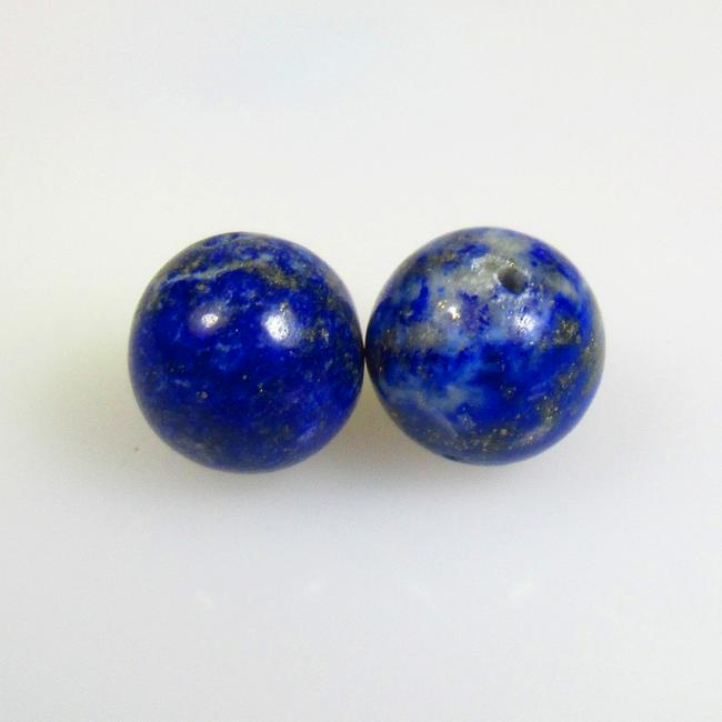 14.10 Ctw Natural 2 Lapis Lazuli Drilled Ball Beads: No Reserve! Title: 14.10 Ctw Natural 2 Lapis Lazuli Drilled Ball Beads Stone Clarity: Transparent Gemstones: Naturla Lapis Lazuli Beads Carat Weights: 14.10 Size/Dimensions: 9.80 x 9.80 mm / 2 Pc's Ad