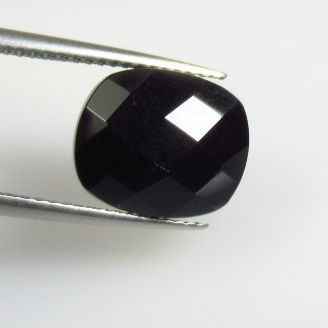 5.46 Ctw Natural Black Onyx Cushion Cut: No Reserve! Title: 5.46 Ctw Natural Black Onyx Cushion Cut Stone Clarity: Opaque Gemstones: Natural Onyx Carat Weights: 5.46 Size/Dimensions: 12.10 x 10.10 x 5.80 mm Additional Information: Cushion Cu