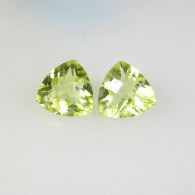 3.49 Ctw Natural Lemon Quartz Trillion Pair: No Reserve! Title: 3.49 Ctw Natural Lemon Quartz Trillion Pair Stone Clarity: VVS Gemstones: Natural Lemon Quartz Carat Weights: 3.49 Size/Dimensions: 8.20 x 8.20 x 5.00 mm / 2 Pc's Additional Informa