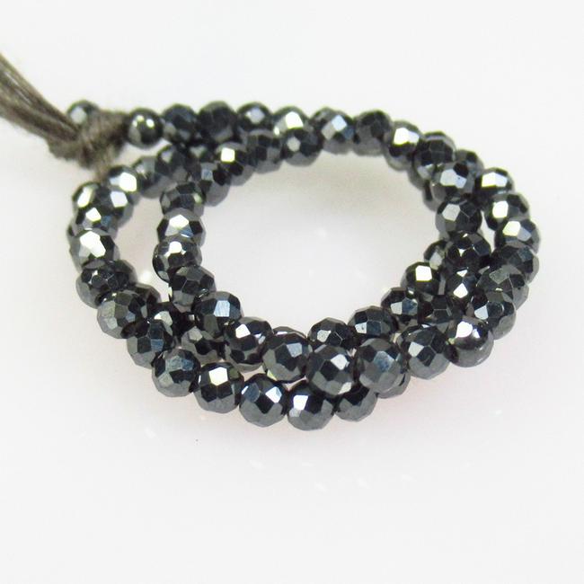 9.36 Ctw Natural 82 Gun Metal Drilled Round Cut Beads: No Reserve! Title: 9.36 Ctw Natural 82 Gun Metal Drilled Round Cut Beads Stone Clarity: Opaque Gemstones: Natural Gun Metal Beads Carat Weights: 9.36 Size/Dimensions: 2.20 x 2.20 mm / 82 Pc's Addition