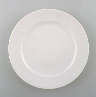 Royal Copenhagen Axel Salto service, White. Lunch plate.: Royal Copenhagen Axel Salto service, White. Lunch plate. Measures: 21 cm. In very good condition. 1st factory quality. Reserve: $35.00 Shipping: Domestic: Shipping rates are determined by destination