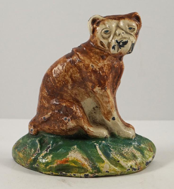 Sitting English Bulldog Dog Cast Iron Doorstop: Title: Sitting English Bulldog Dog Cast Iron Doorstop Dimension: 5 3/8” tall x 5 1/8” wide. Date: Ca. 1930’s. Additional Information: Incredible refined casting of this Bulldog Doors