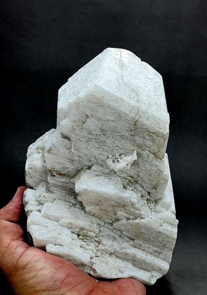 1437 Grams Very Beautiful Step Microcline Feldspar Crystal From Skardu Pakistan: Materials: Microcline FeldsparDescription1437 Grams Very Beautiful Step Microcline Feldspar Crystal From Skardu PakistanSize 15.7 CM X 12.2 CM X 9.1 CMReserve: $100.00Shipping:Domestic: Flat-rate of $