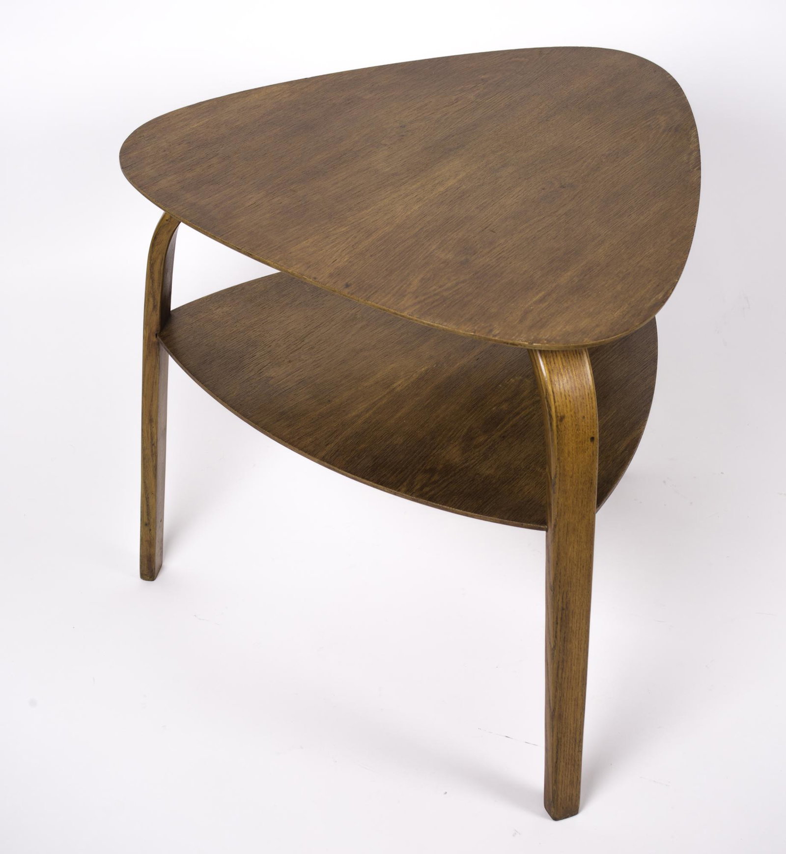 Steiner bow wow side table french mid century: The Bow Wood Side Table created by Hugues Steiner ( son of Charles steiner ) is considered modern due to its use of materials, unique design, and versatility. It is a well-crafted and visually strikin