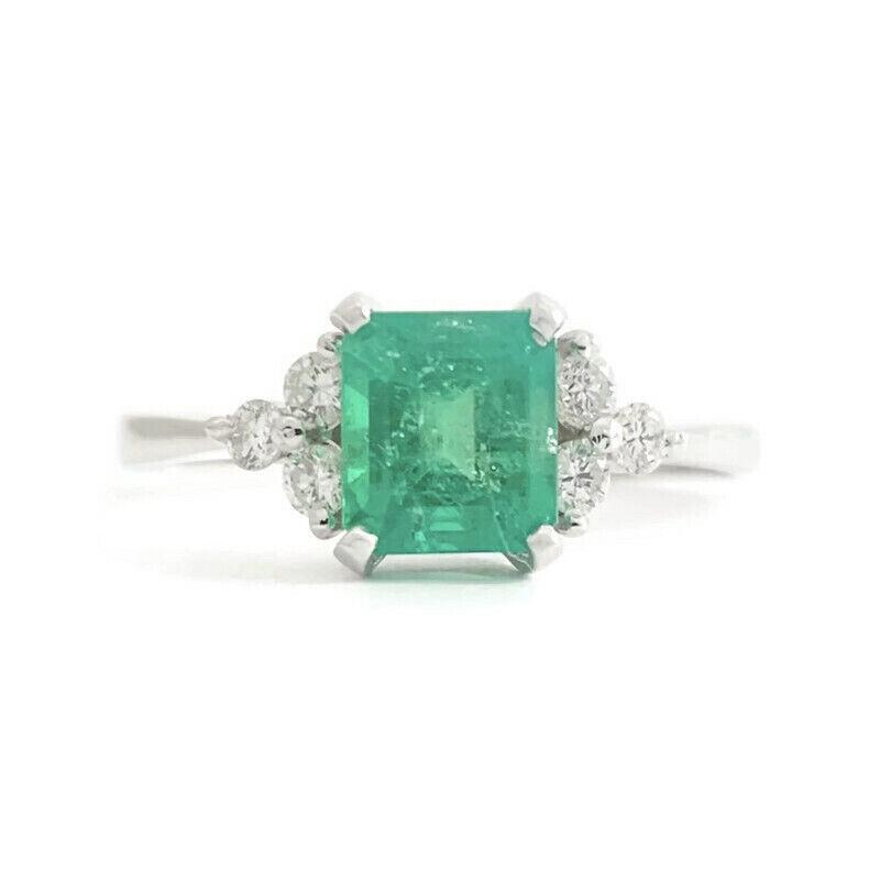 Emerald Cut Green Emerald Diamond Gemstone Ring 14K White Gold 1.08 CTW, 1.96 Gr: Emerald Cut Green Emerald Diamond Gemstone Ring 14K White Gold 1.08 CTW, 1.96 Gr This is a beautiful ring that could be worn as a statement or engagement ring! Don't hesitate to ask any questions! Gem