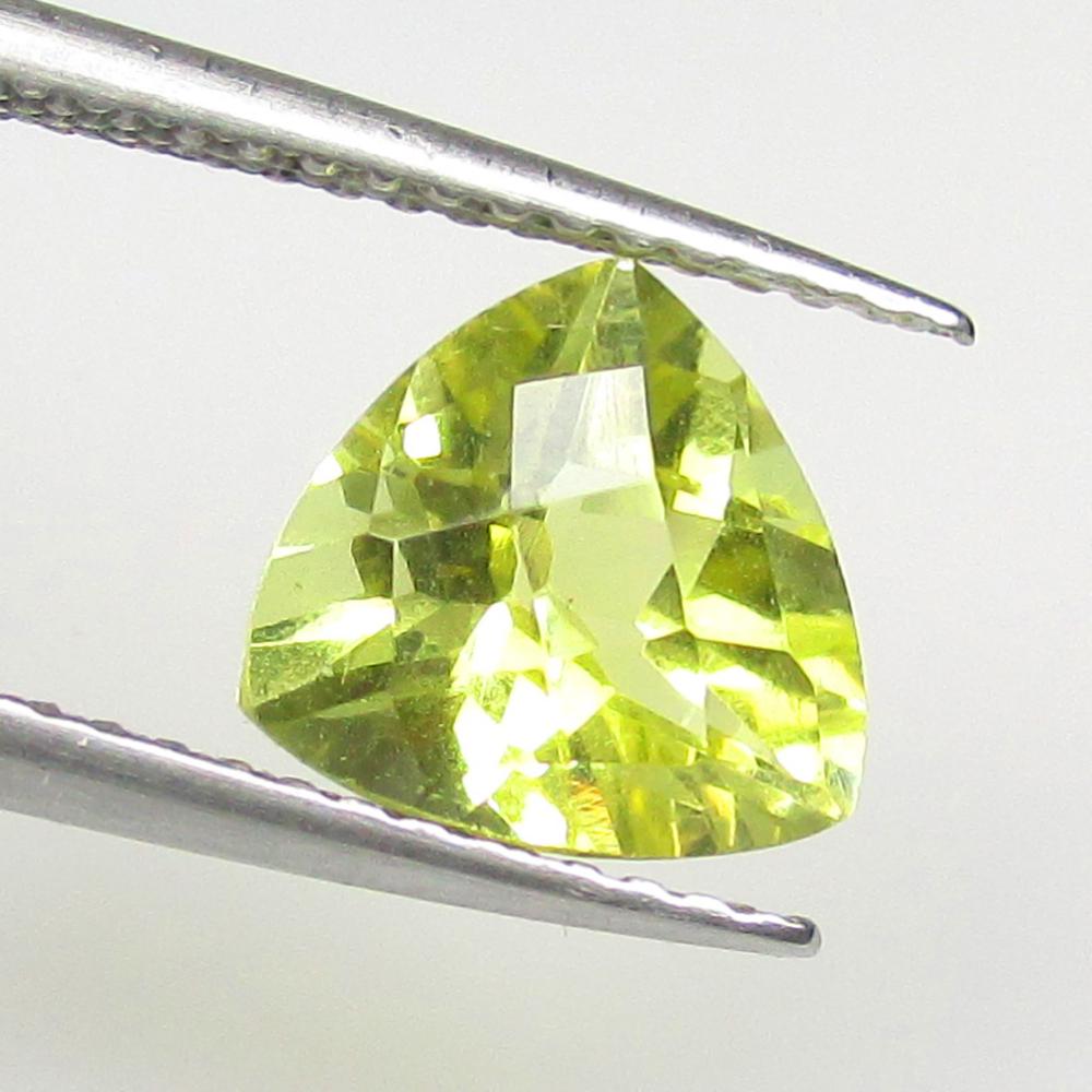 1.70 Ctw Natural Lemon Quartz Trillion Cut: No Reserve! Title: 1.70 Ctw Natural Lemon Quartz Trillion Cut Stone Clarity: VVS Gemstones: Natural Lemon Quartz Carat Weights: 1.70 Size/Dimensions: 8.20 x 8.00 x 5.60 mm Additional Information: Good