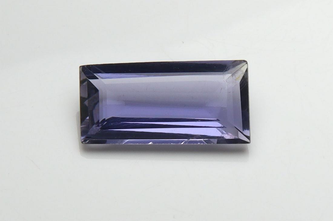 Gorgeous " Natural Iolite Violet " 2.56 Cts Natural Iolite: No Reserve! Title: Gorgeous " Natural Iolite Violet " 2.56 Cts Natural Iolite Additional Information: Gemstone : Natural Iolite Shape and Cut : Rectengular Cut Weight : 2.56 Carats Measuremets : 13.40