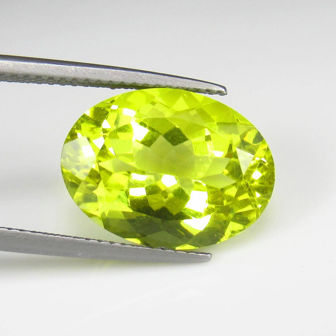 Natural Lemon Quartz - 9.83 Ct: No Reserve! Title: Natural Lemon Quartz - 9.83 Ct Origin: Africa Weight: 9.83 Size/Dimensions: 16.0 x 12.0 x 9.2 mm Additional Information: Pieces : 1 No's / Shape : Oval Cut / Color : Greenish Yellow