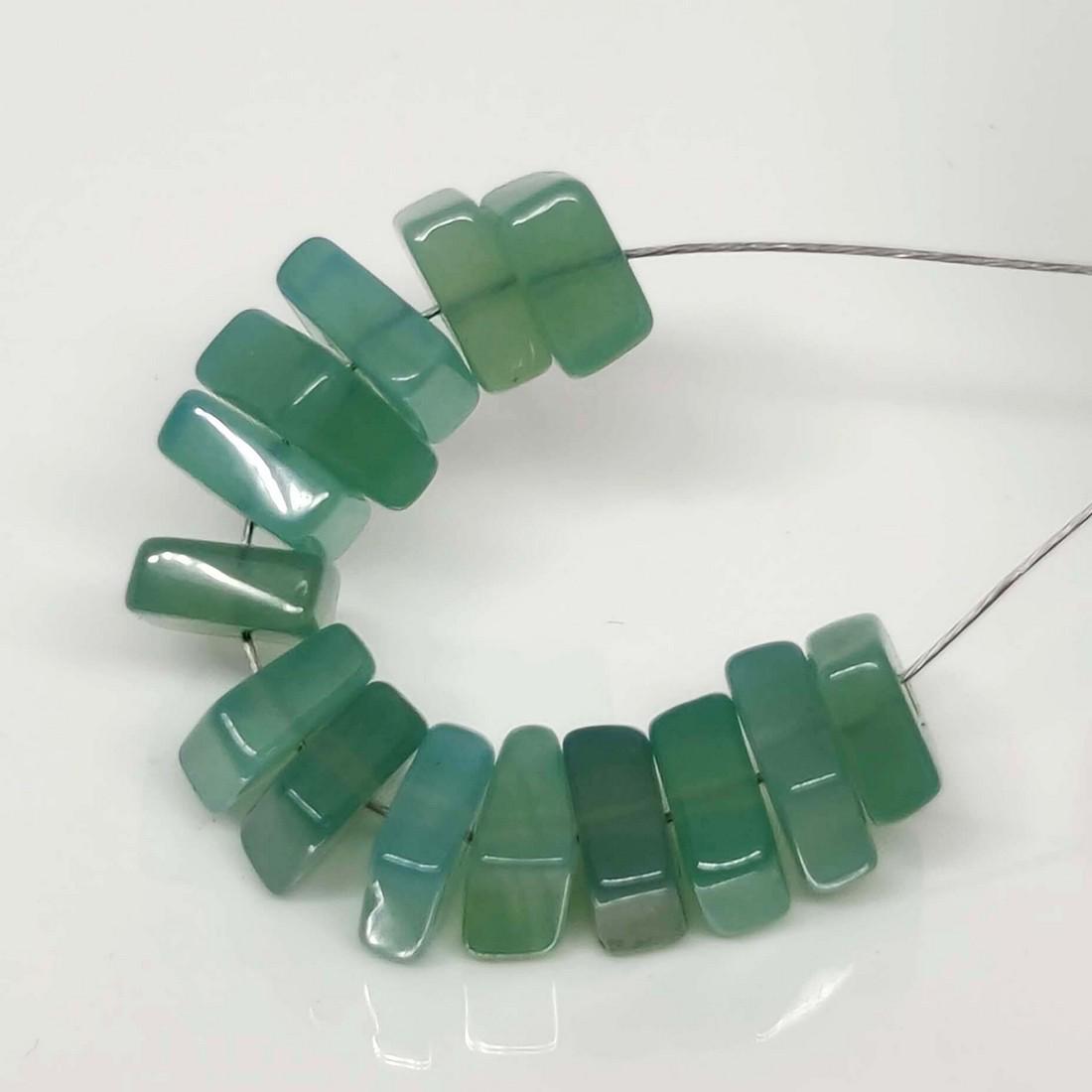 8 Ct Natural Blue Chalcedony Drilled Beads: No Reserve! Title: 8 Ct Natural Blue Chalcedony Drilled Beads Additional Information: Gemstones: Natural Blue Chalcedony Carat Weights: 8 ct Size/Dimensions: 4 - 5 mm Approx Treatment: None Materials