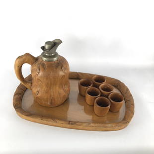 Aldo Tura carafe, tray and glasses set for Macabo. 50s: Original vintage condition with evident trace of age and use. Labeled. Material: wood Dimensions: H 30 W 54 D 35 Please note that this lot has a confidential reserve. When you leave a bid in advance o