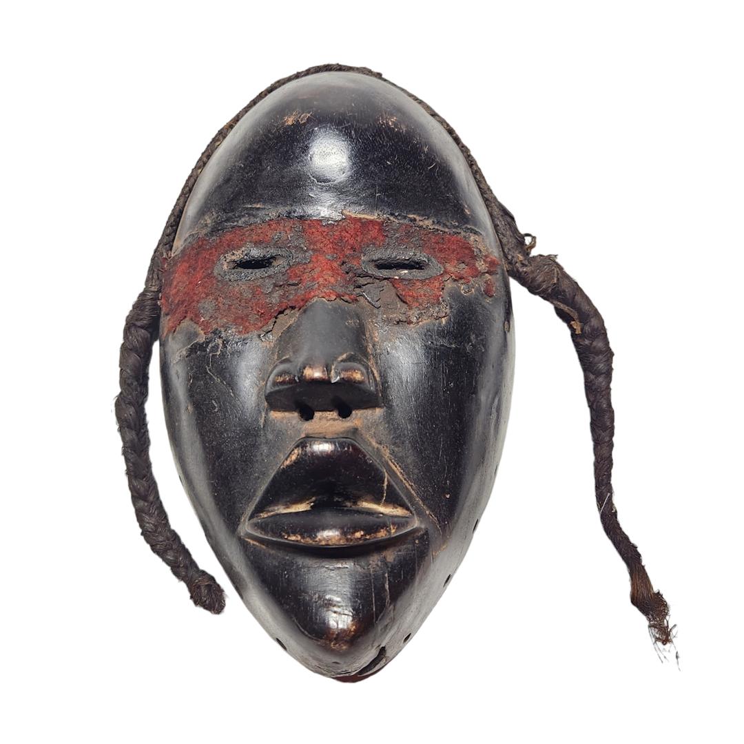 Dan Mask: Title: Dan Mask Date/Period: 19th Century Origin: Ivory Coast, Africa Size: 6in X 2.5in X 9in Reserve: $80.00 Shipping: Domestic: Flat-rate of $25.00 to anywhere within the contiguous U.S. Internation