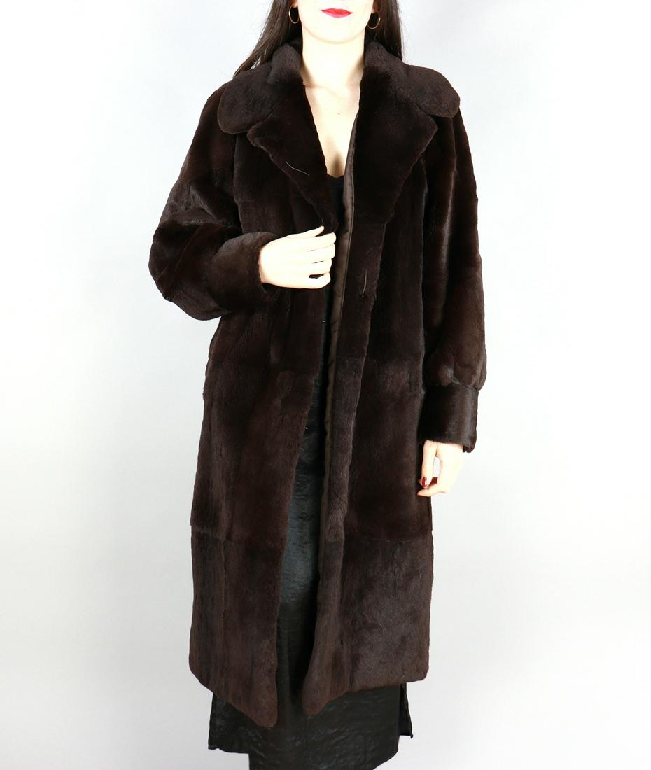 BROWN SHEARED LAPIN FUR COAT EU: M; US: 12: Title/Content: BROWN SHEARED LAPIN FUR COAT EU: M; US: 12 Size/Dimensions: Approximate size- EU: M; US: 12 : Important details: Length: 110cm/43.31in -Shoulders width:40cm/15.75in -Sleeve Length:62cm/