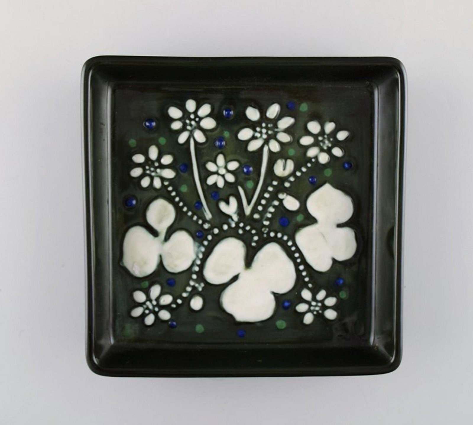 Sylvia Leuchovius for Rörstrand. Square dish in glazed ceramics. White flowers on green (1 of 4)
