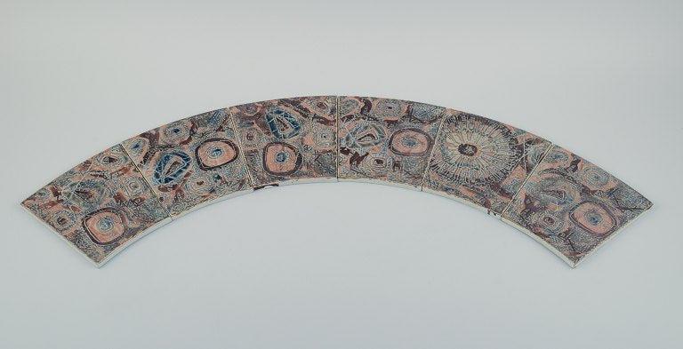 Royal Copenhagen, six Baca faience tiles with patterned glaze in brown, blue and green. (1 of 5)