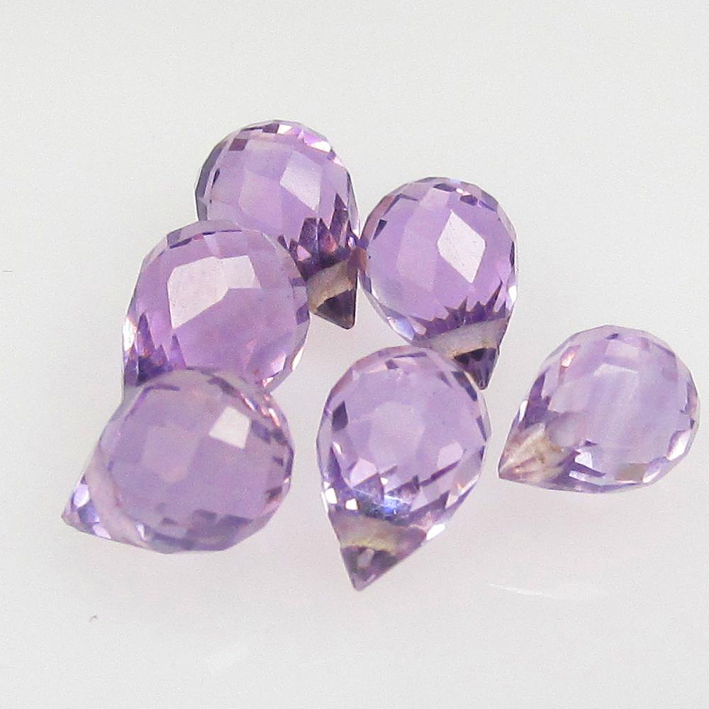 4.66 Ctw Natural 6 Drilled Purple Amethyst Pear Drop Beads: No Reserve! Title: 4.66 Ctw Natural 6 Drilled Purple Amethyst Pear Drop Beads Stone Clarity: Transparent Gemstones: Natural Amethyst Beads Carat Weights: 4.66 Size/Dimensions: 6.5x4.5 - 7.5x5.1 mm / 6