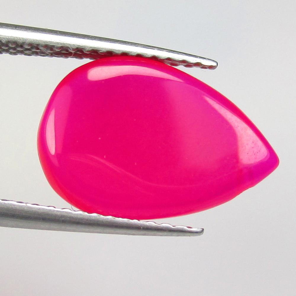 2.93 Ctw Natural Drilled Pink Onyx Pear Cab: No Reserve! Title: 2.93 Ctw Natural Drilled Pink Onyx Pear Cab Stone Clarity: Opaque Gemstones: Natural Onyx Carat Weights: 2.93 Size/Dimensions: 14.10 x 9.60 x 3.20 mm Additional Information: Very Go
