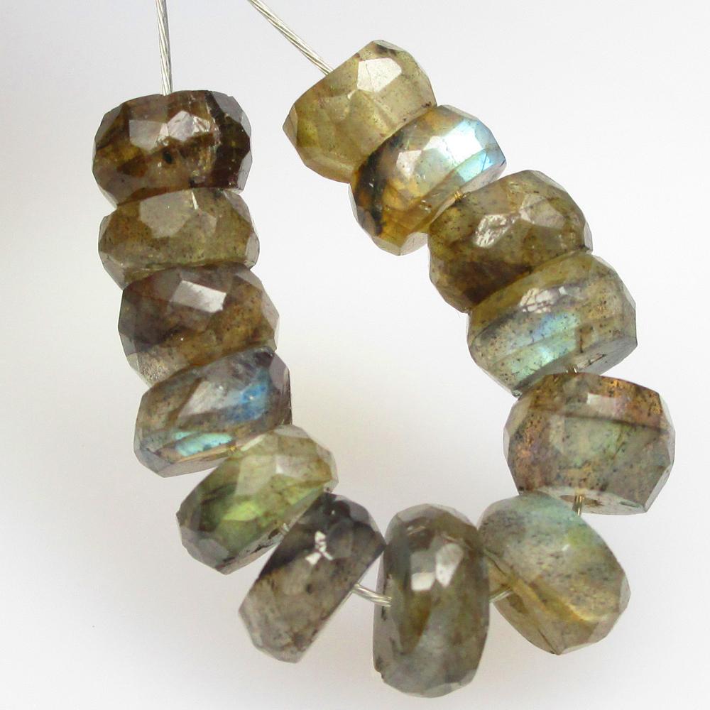 7.24 Ctw Natural 13 Labradorite Round Beads: No Reserve! Title: 7.24 Ctw Natural 13 Labradorite Round Beads Stone Clarity: Opaque Gemstones: Natural Labradorite Beads Carat Weights: 7.24 Size/Dimensions: 4.90 - 5.60 mm / 13 Pc's Additional Infor
