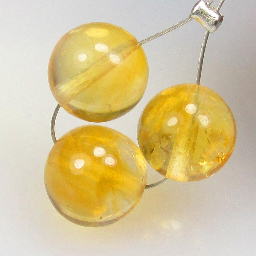9.93 Ctw Natural 3 Citrine Drilled Round Beads: No Reserve! Title: 9.93 Ctw Natural 3 Citrine Drilled Round Beads Stone Clarity: Transparent Gemstones: Natural Citrine Beads Carat Weights: 9.93 Size/Dimensions: 7.70 - 8.10 mm / 3 P'cs Additional In