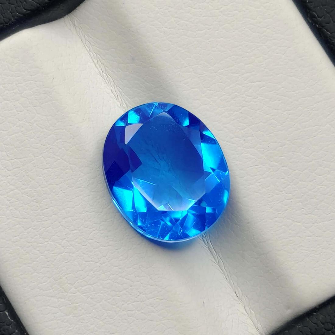 4.90 Ct "Beautiful" Caribbean Blue Triplet Quartz: No Reserve! Gemstones: Triplet Quartz Carat Weights: 4.90 ct Size/Dimensions: 12 X 10 mm Treatment: Made of two natural quartz About Stone: This is a doublet stone doublet basically means two, these s