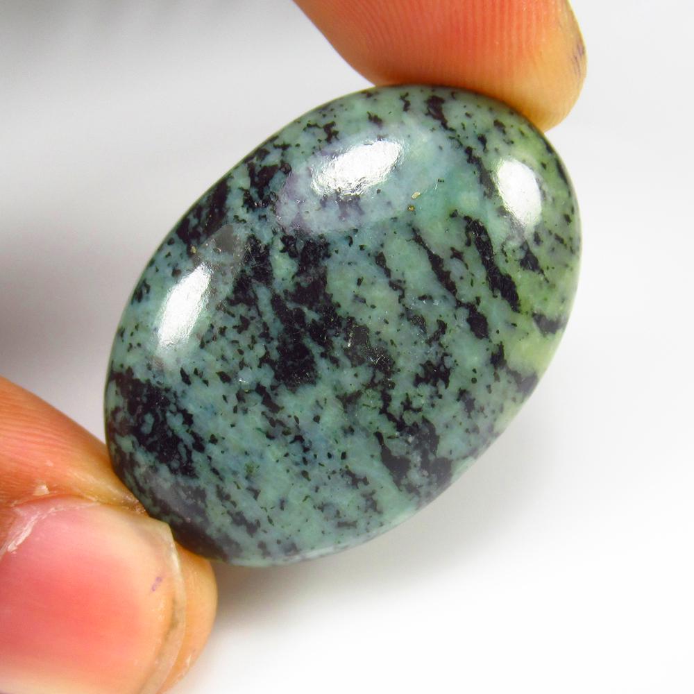 45.21 Ct - Natural Palm Ocean Jasper: No Reserve! Title: 45.21 Ct - Natural Palm Ocean Jasper Additional Information: Gemstone Metal Purity: - Gemstones: Jasper Carat Weights: 45.21 Size/Dimensions: 35.0 x 23.0 x 6.5 mm Additional Informa