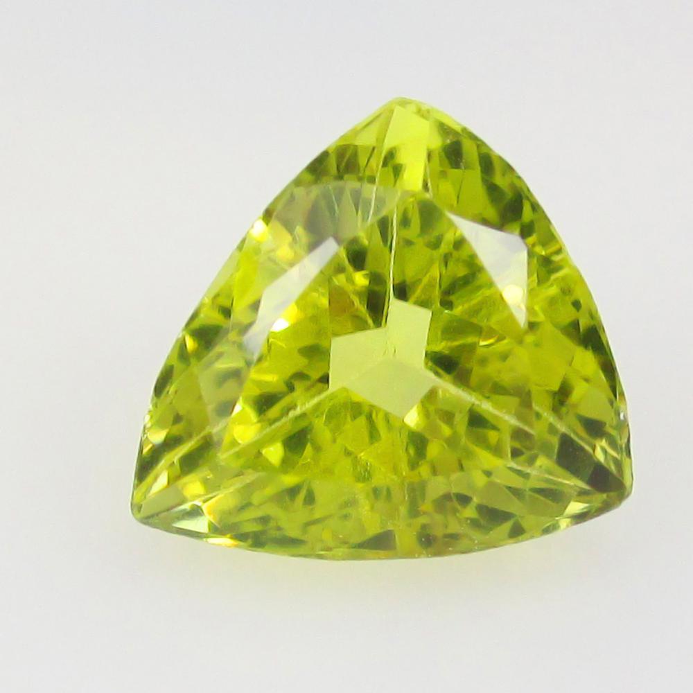 6.46 Ctw Natural Lemon Quartz Trillion Cut: No Reserve! Title: 6.46 Ctw Natural Lemon Quartz Trillion Cut Stone Clarity: VVS Gemstones: Natural Lemon Quartz Carat Weights: 6.46 Size/Dimensions: 13.20 x 12.10 x 8.70 mm Additional Information: Go