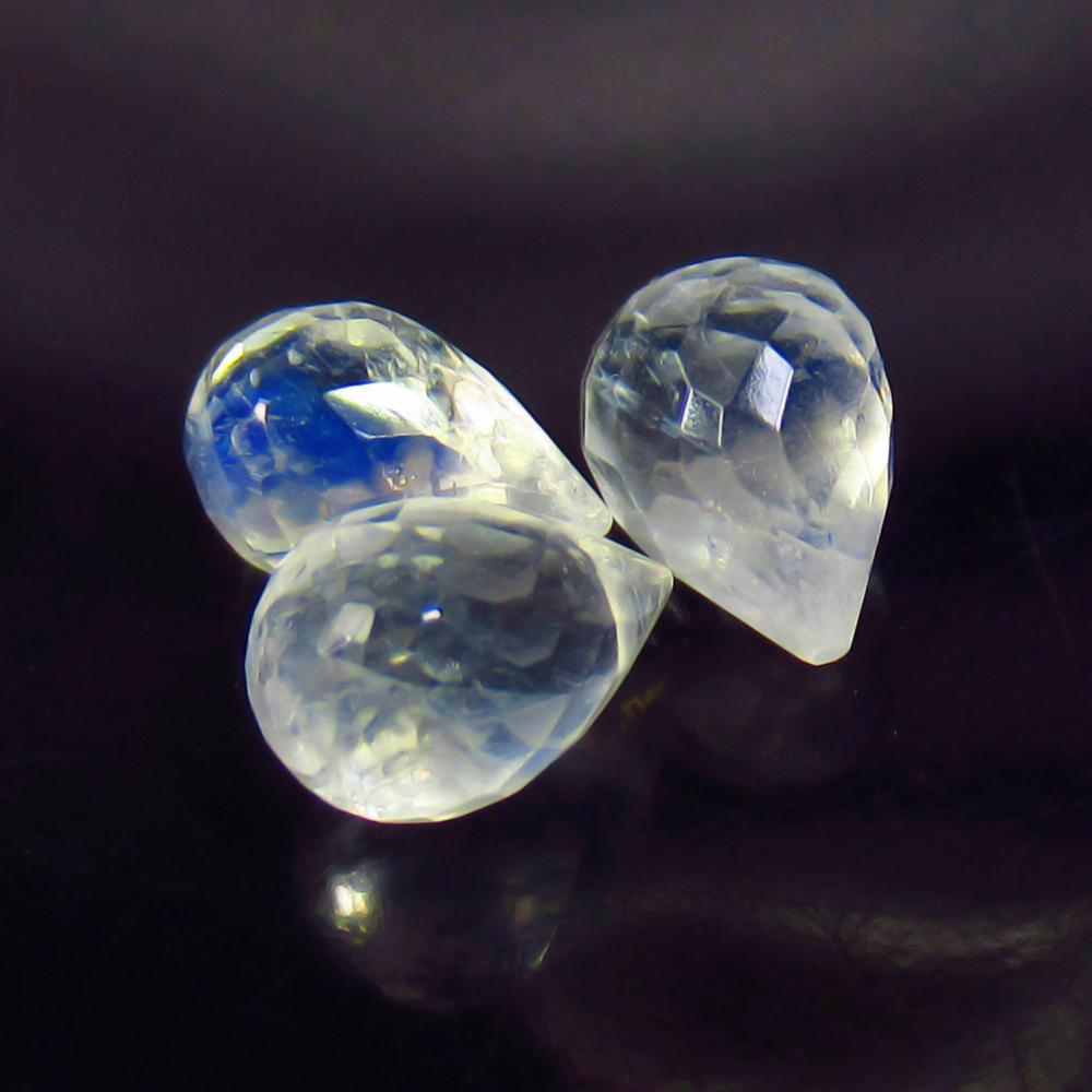 3.91 Ctw Natural 3 Drilled Blue Moonstone Pear Drop Beads: No Reserve! Title: 3.91 Ctw Natural 3 Drilled Blue Moonstone Pear Drop Beads Stone Clarity: Transparent Gemstones: Natural Blue Moonstone Beads Carat Weights: 3.91 Size/Dimensions: 7.6x5.3 - 8.0x5.4 m