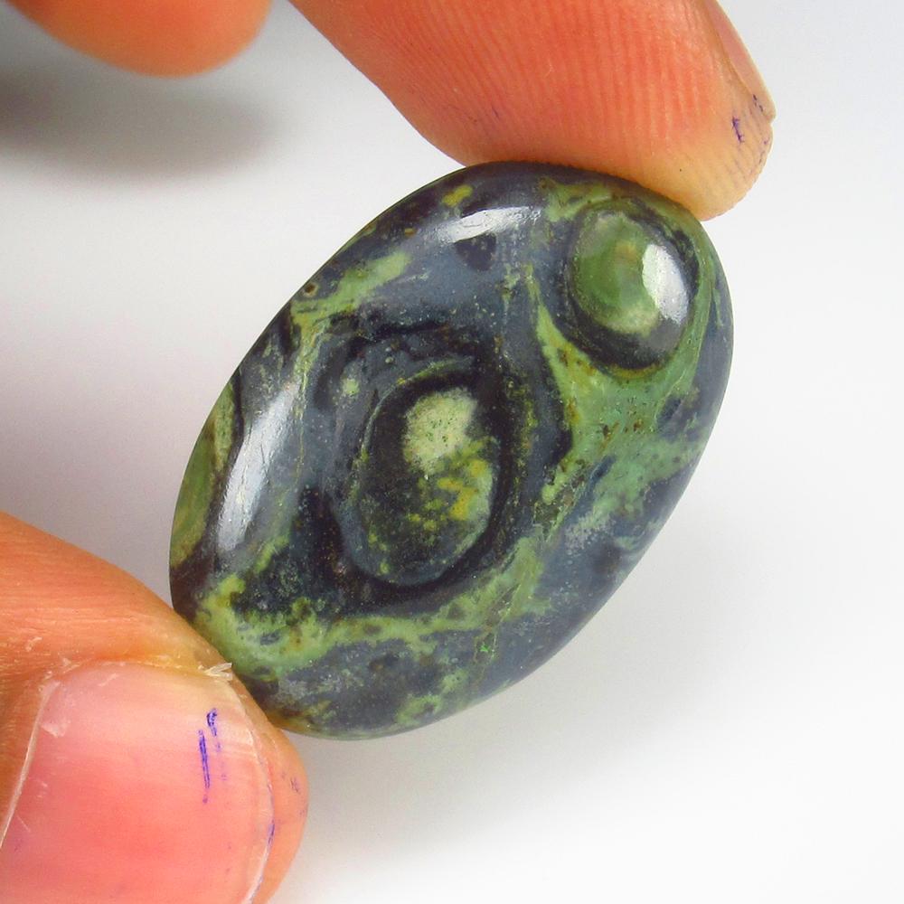 Natural KInbaba Jasper - 18.98 Ct: No Reserve! Title: Natural KInbaba Jasper - 18.98 Ct Origin: Brazil Weight: 18.98 Size/Dimensions: 28.0 x 18.5 x 4.7 mm Additional Information: Pieces : 1 No's / Shape : Oval Cabochon / Color : Green