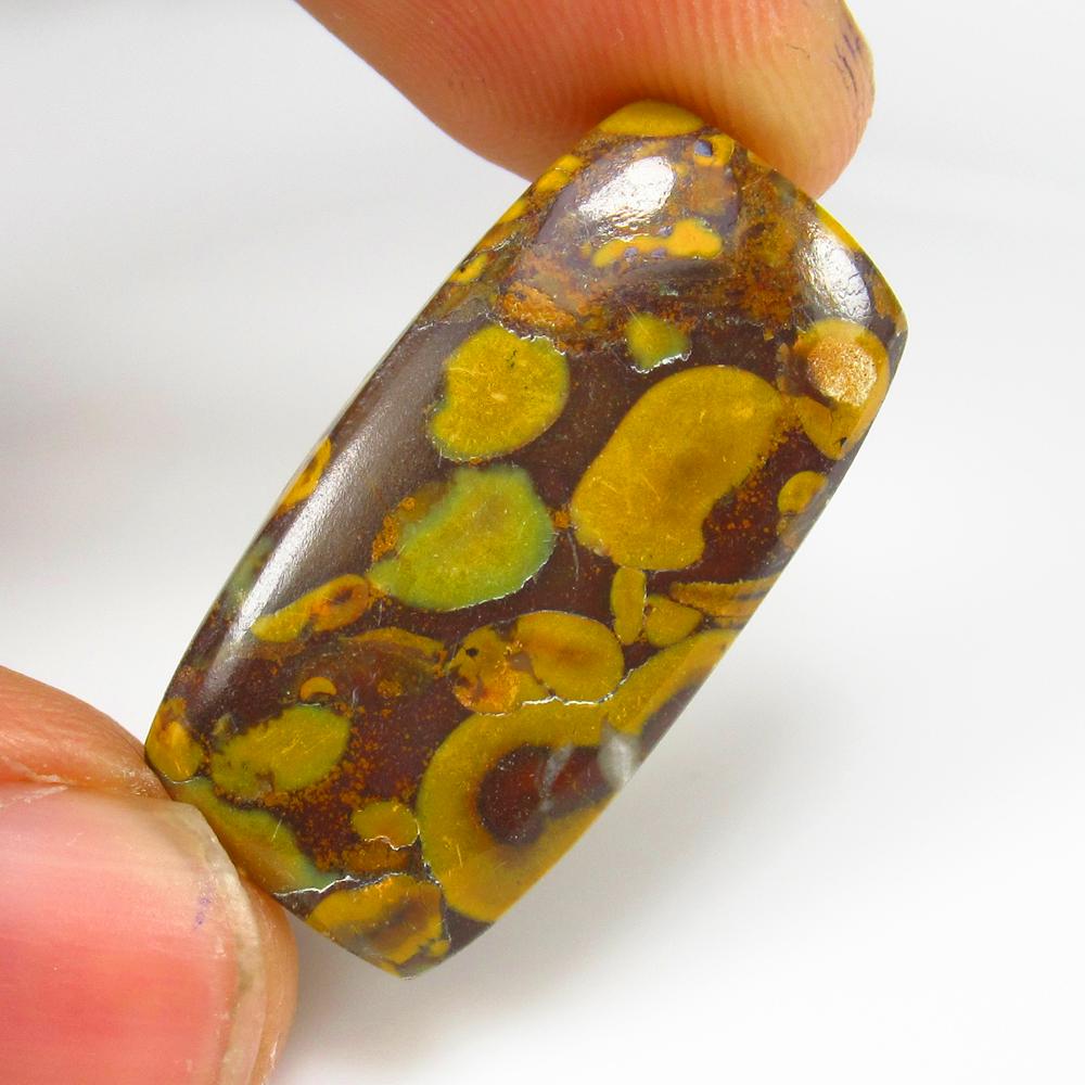 21.23 Ct - Natural Fruit Jasper: No Reserve! Title: 21.23 Ct - Natural Fruit Jasper Additional Information: Gemstone Metal Purity: - Gemstones: Jasper Carat Weights: 21.23 Size/Dimensions: 28.0 x 15.0 x 4.3 mm Additional Information: