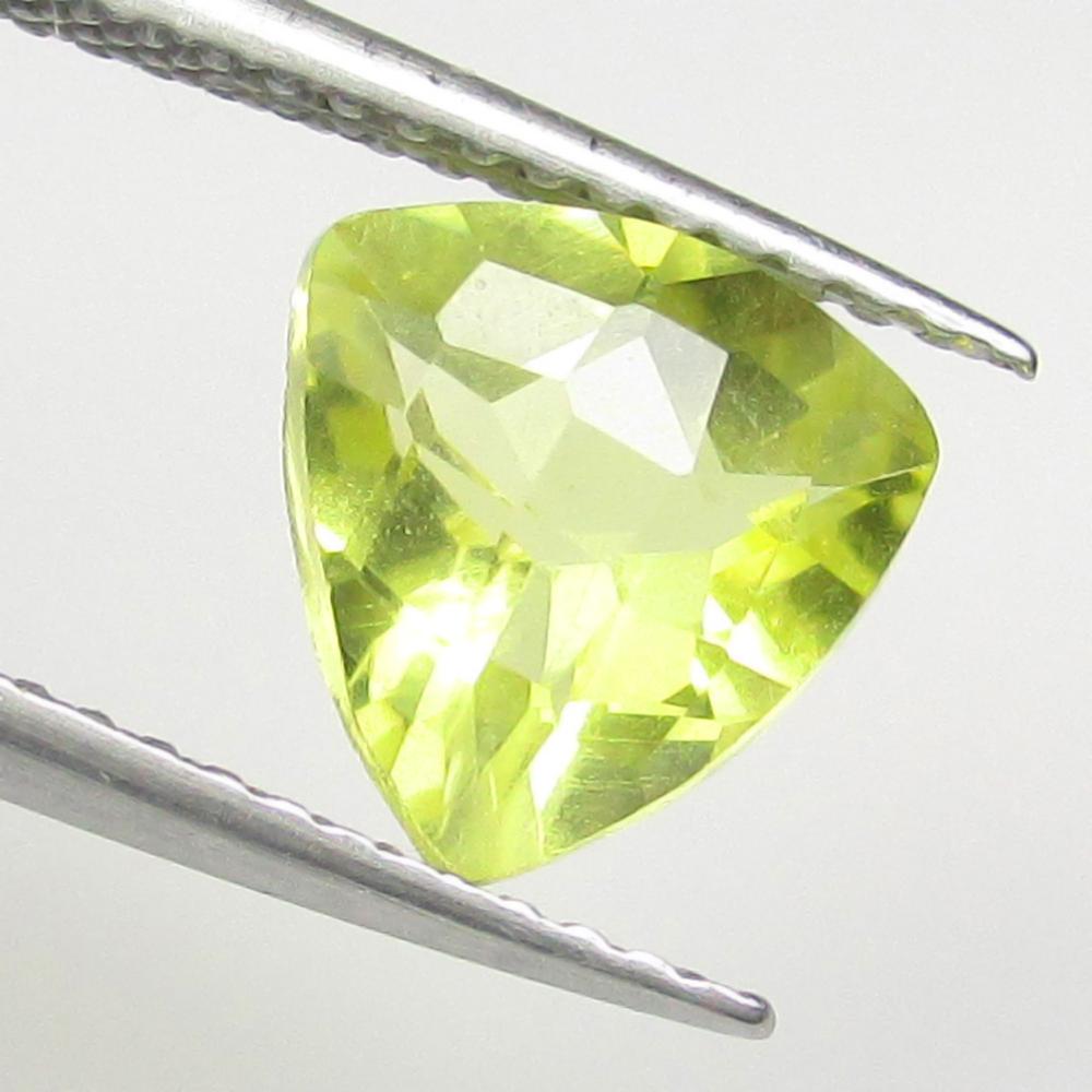 1.65 Ctw Natural Lemon Quartz Trillion Cut: No Reserve! Title: 1.65 Ctw Natural Lemon Quartz Trillion Cut Stone Clarity: VVS Gemstones: Natural Lemon Quartz Carat Weights: 1.65 Size/Dimensions: 8.40 x 8.50 x 5.30 mm Additional Information: Good