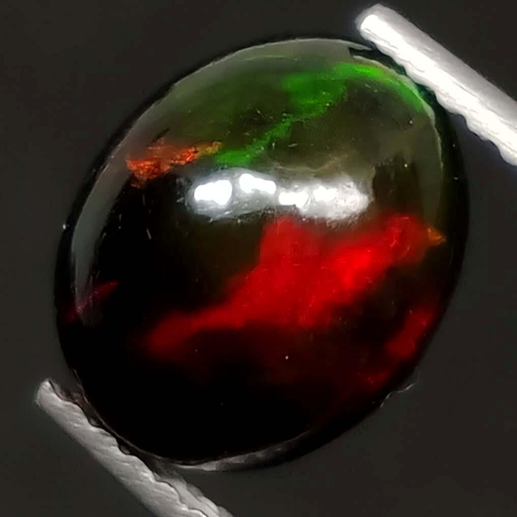 1.90 Ct "Play Of Colors" Natural Black Opal (1 of 5)