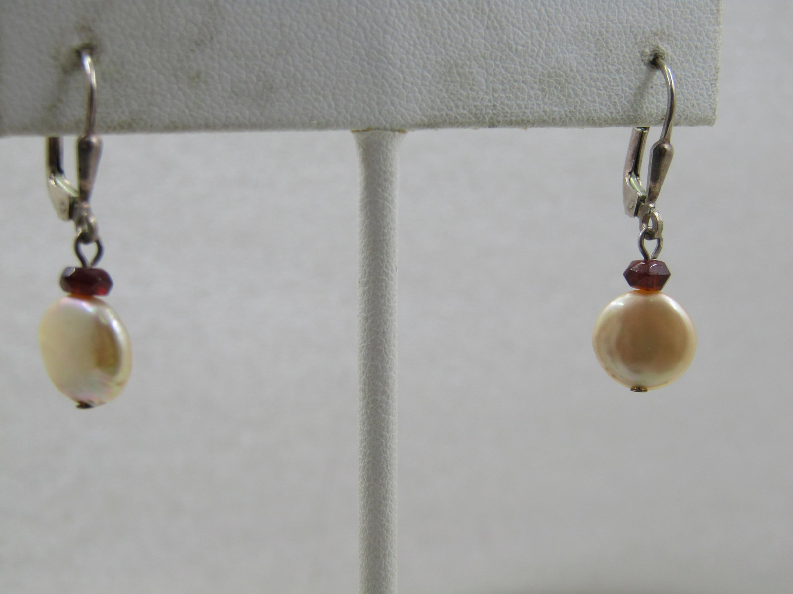 Vintage Sterling Pearl & Garnet Leverback Earrings, 1970's-1980's: Vintage Sterling Pearl & Garnet Leverback Earrings, 1970's-1980's. The earrings are appx. 1.25" long from top of post to bottom of the baroque freshwater pearl. There is an appx. 3.5mm natural garnet 