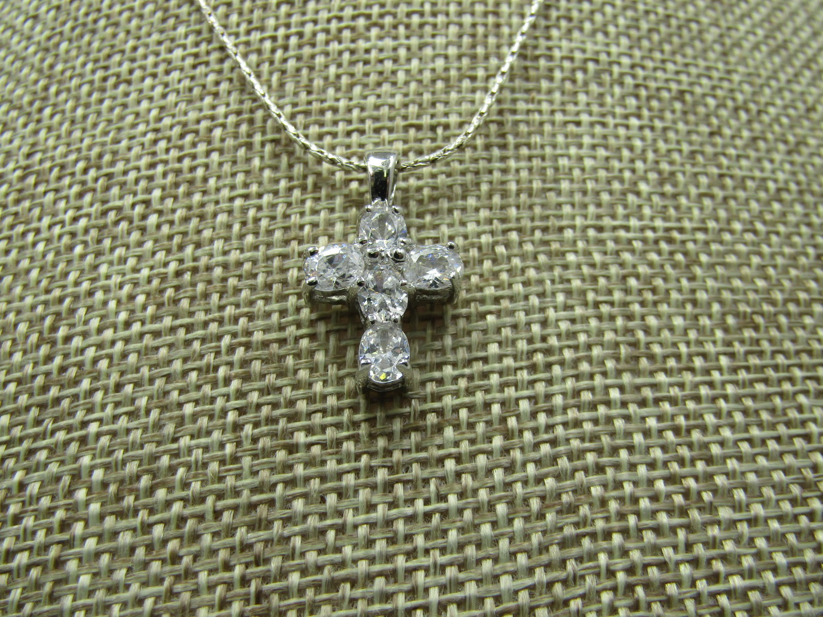 Vintage Sterling CZ Cross Necklace, 24" signed Milor, Italy: Vintage Sterling CZ Cross Necklace, 24" signed Milor, Italy. This is a hammered or notched Boston link style with spring clasp. it is appx. 1mm wide. The cross has five oval clear stones that are appx