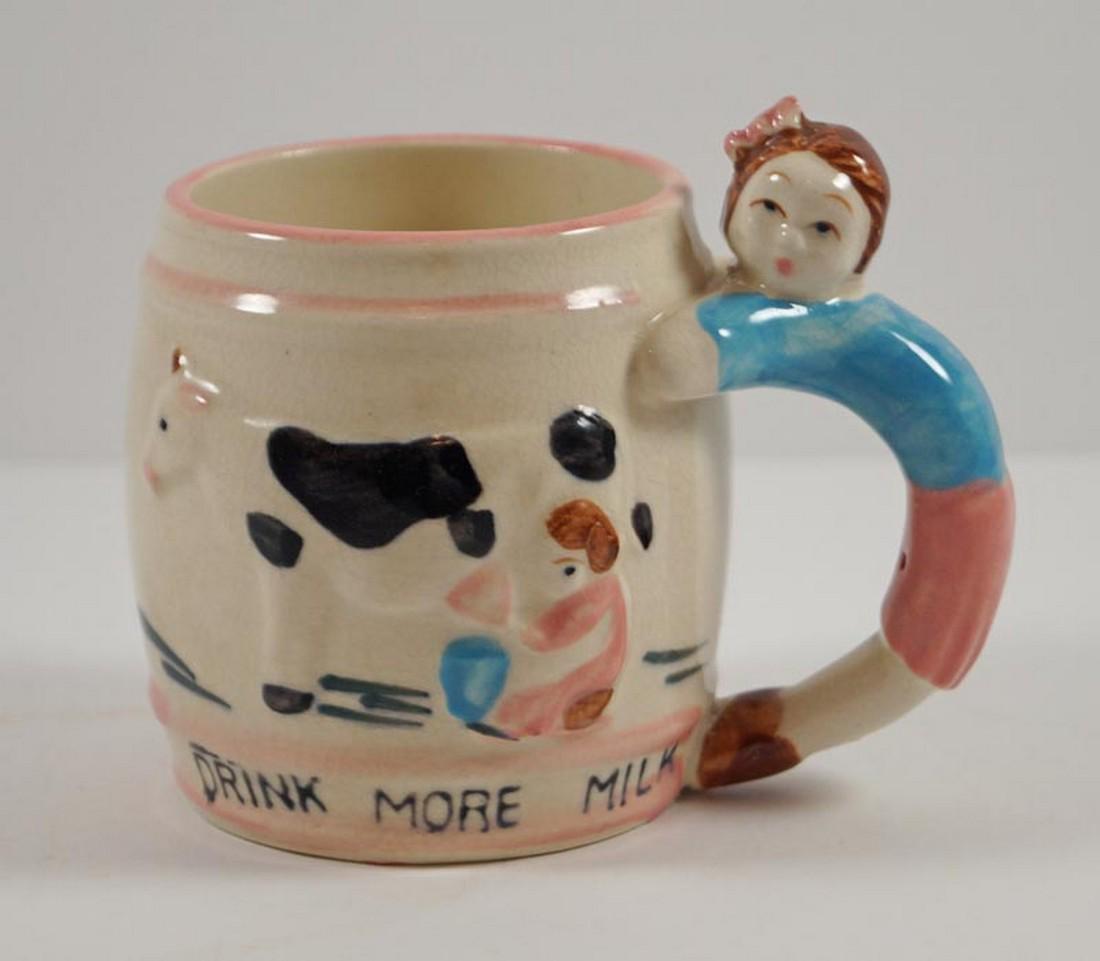 Vintage Children's Drink More Milk Mug Ceramic: Title: Vintage Children's Drink More Milk Mug Ceramic Dimension: 3 3/4" tall x 4 3/8" wide including handle x 2 5/8" dia. Additional Information: A wonderful Milk Mug for a little girl. Done in pink a