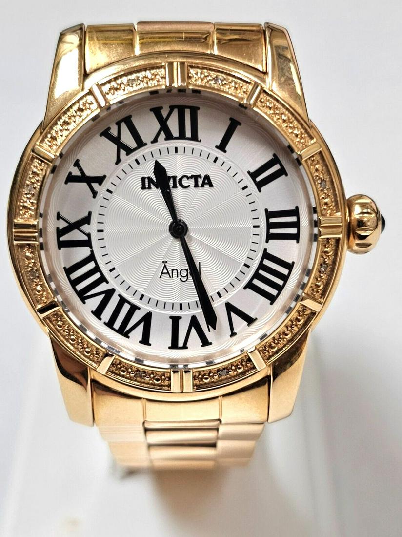 Designer Invicta Angel 14718 8 Diamonds Bezel Gold Tone Unisex Quartz Watch: Designer Invicta Angel 14718 8 Diamonds Bezel Gold Tone Unisex Quartz Watch * Very Good Condition. * New Battery. * Not Scratches on The Crystal. * White Dial 41mm Movement Diameter. * Gold Tone Stain